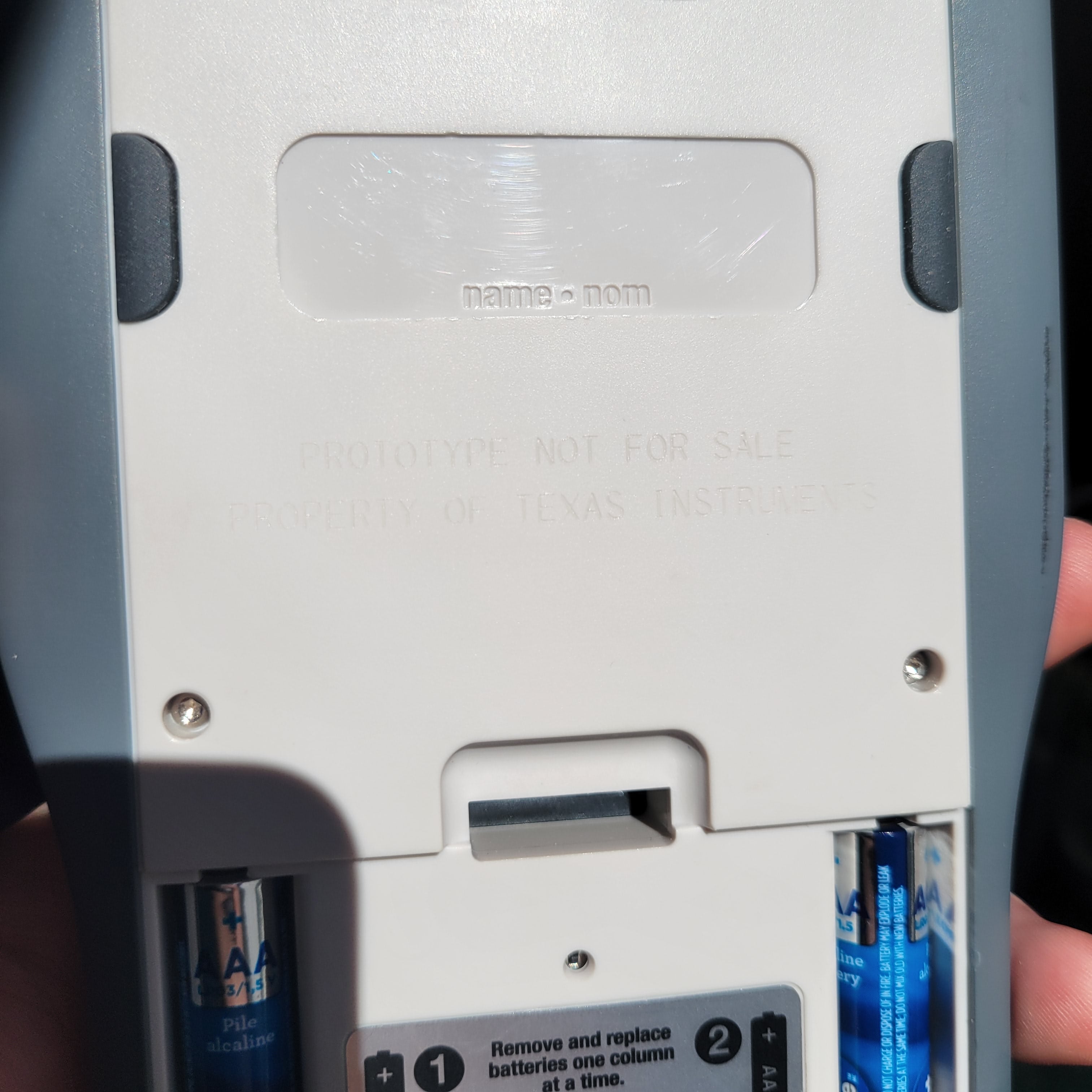 An image of the textreading 'prototype' on the back of a texas instruments ti nspire cas plus symbolic calculator